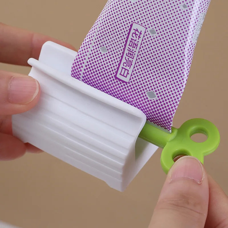 Mini Rolling Tube Toothpaste Squeezer Dispenser